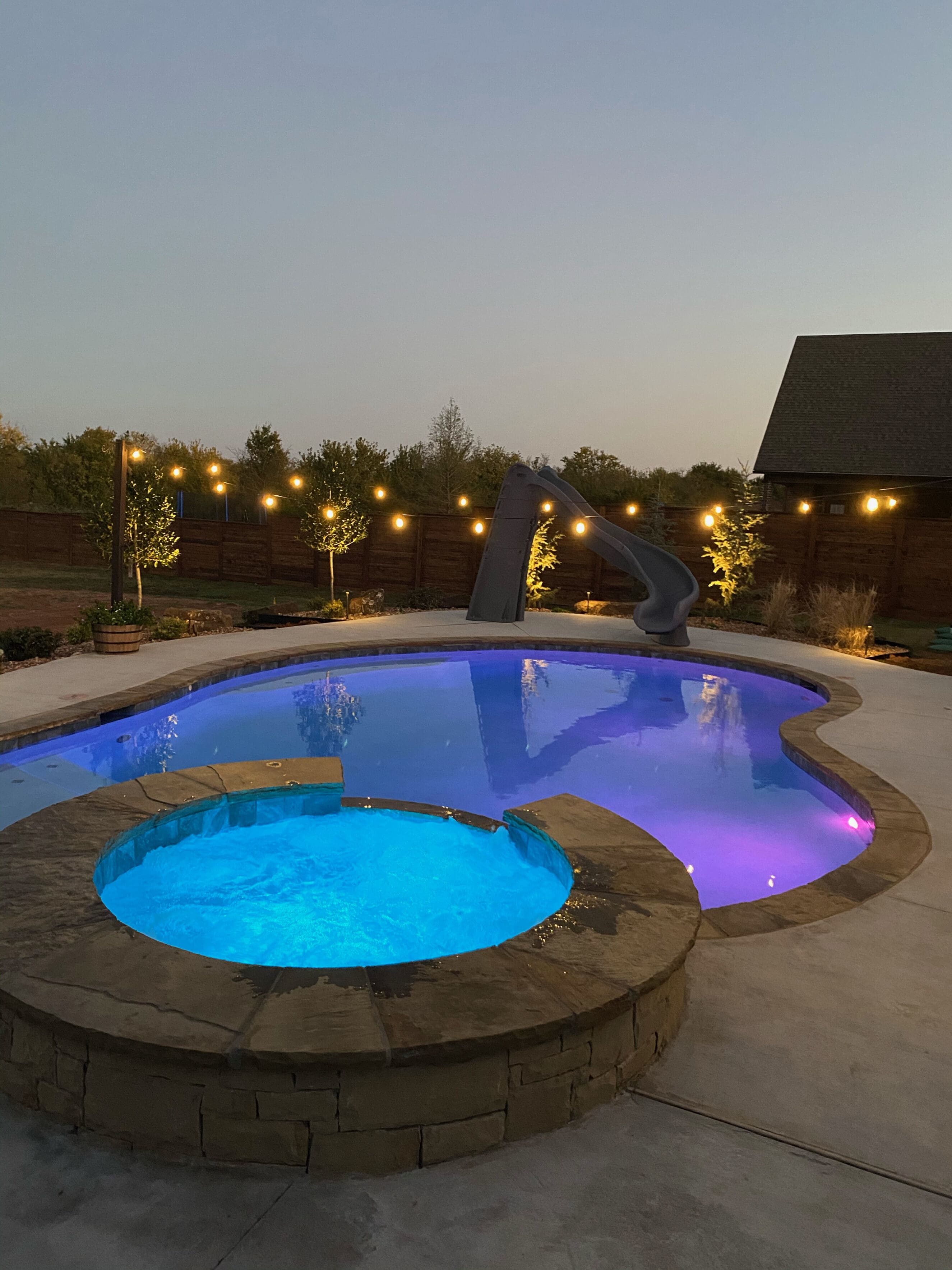 Outdoor pool with slide